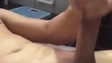 Masturbating